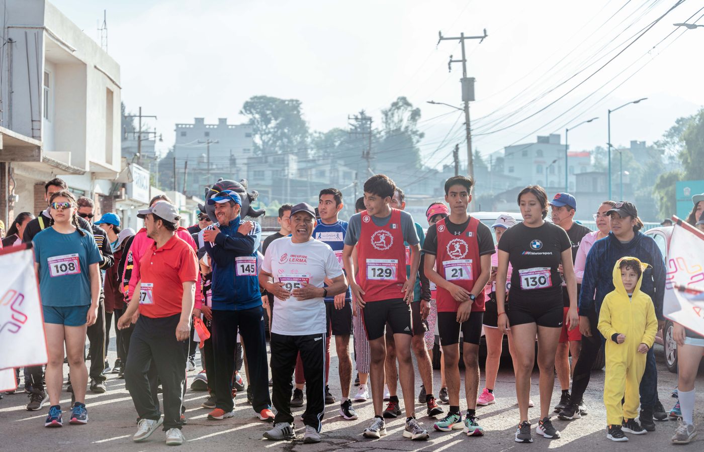 Crowd energy, sponsor visibility and finish-line proof.